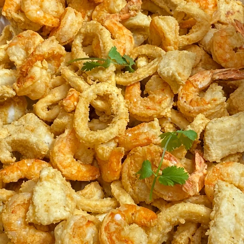Fried calamari and seafood with parsley