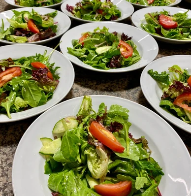 Fresh salads prepared for a catered event