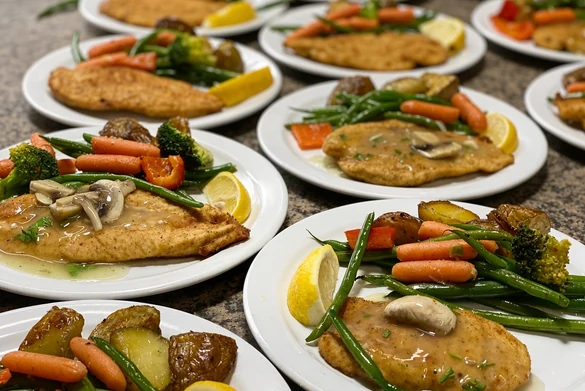 Rows of plated banquet entrées